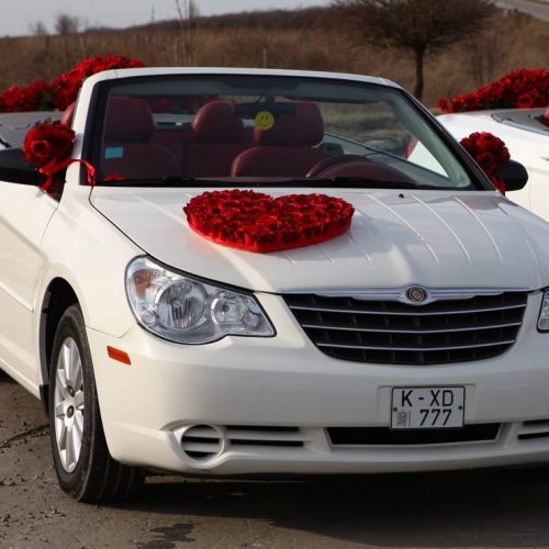 Chrysler Sebring decapotabilă albă